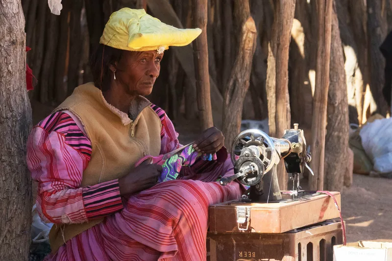 A woman working at a sewing machine