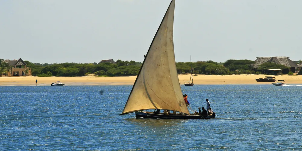 A dhow under sail off the coast