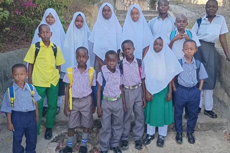 Students from the LongSan Maritime CBO community in their school uniforms